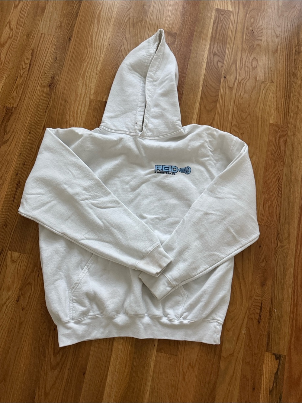 Lacrosse White Hoodie with Blue Logo Shield